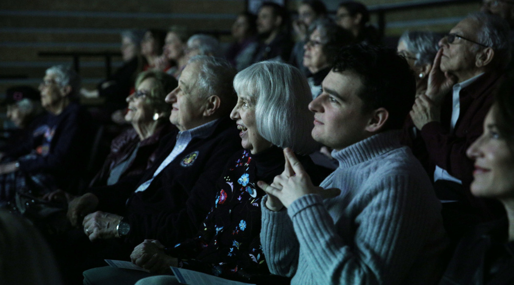 Participants watch their short films with friends and family.