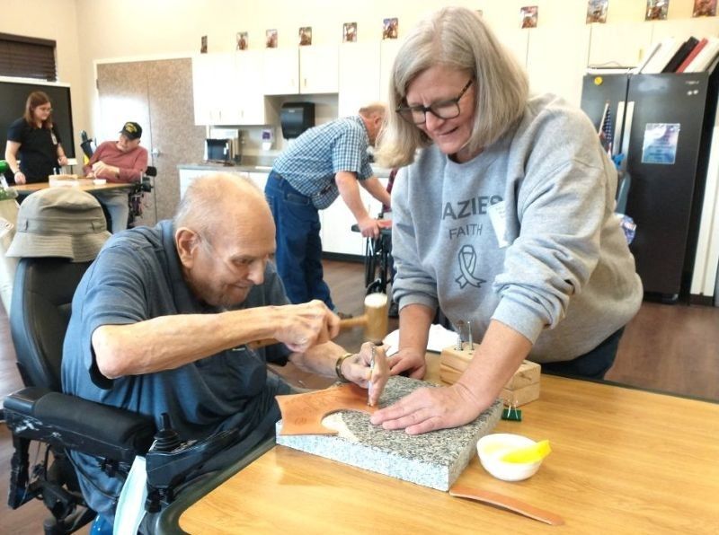 Saddlemaker Shelley Ensley teaches leather tooling in the Idaho State Veterans Home in Lewiston.