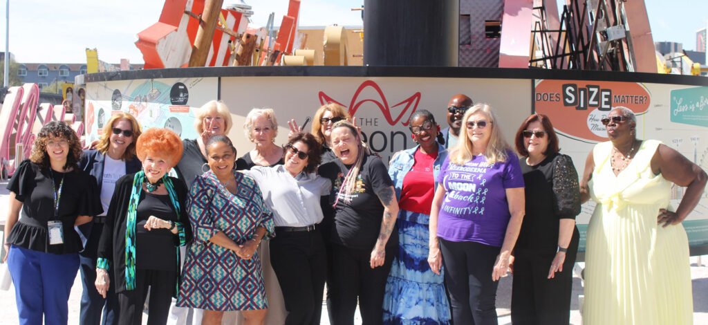 Joylynn poses with her students outside The Neon Museum.